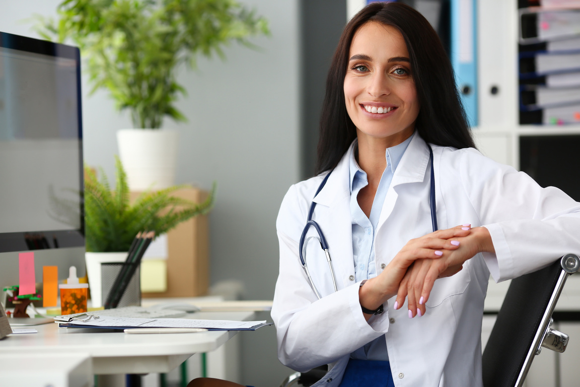 Indian Female Doctor Portrait Aganist Hospital