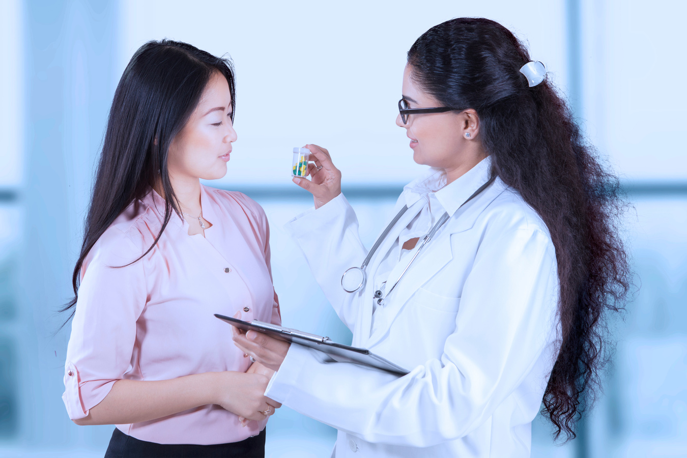 Indian Doctor Explaining Medicine for Patient